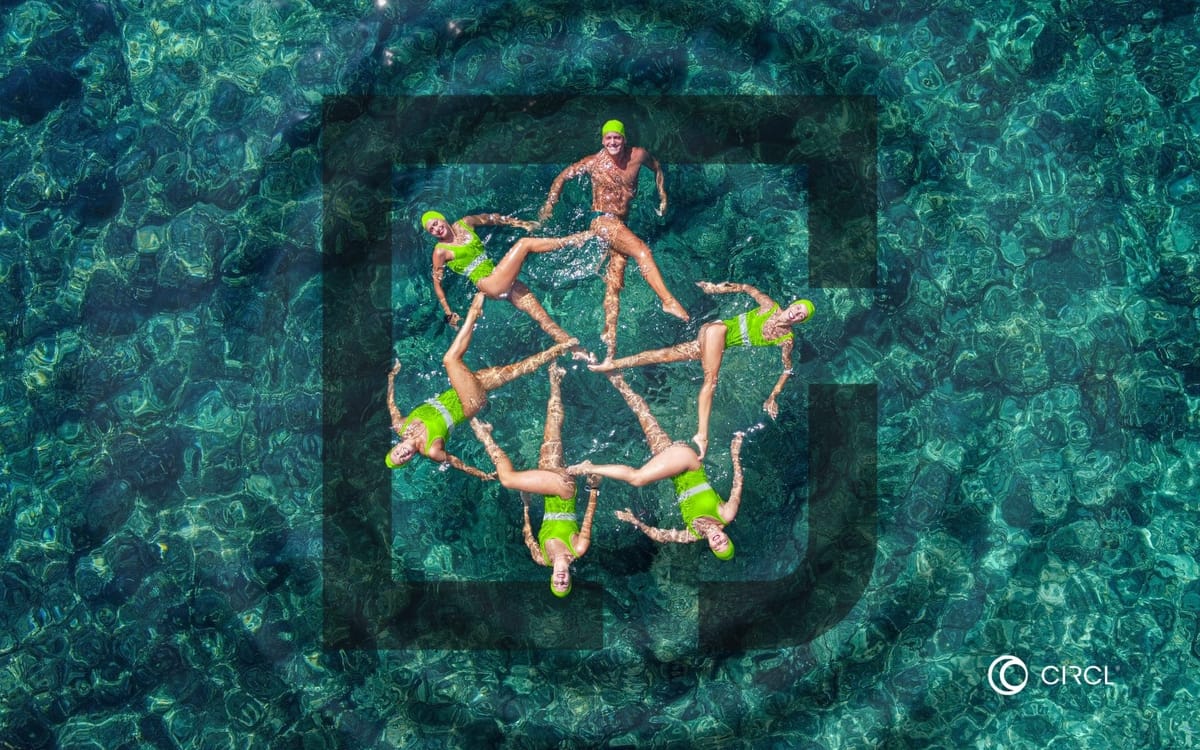 Circl Group's workforce floating in formation as the Circl mark, seen from above
